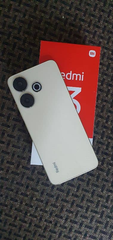 Redmi 13  sandy gold almost new open box 1