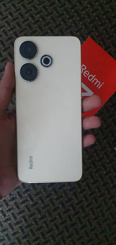 Redmi 13  sandy gold almost new open box 2