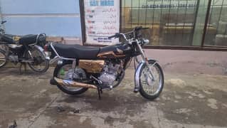 honda 125 self start golden colour