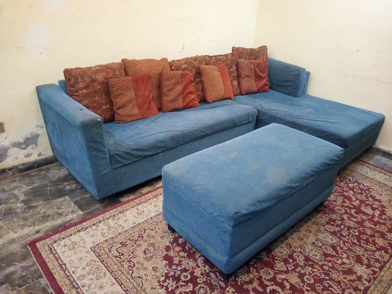 sofa with foot stool table 0