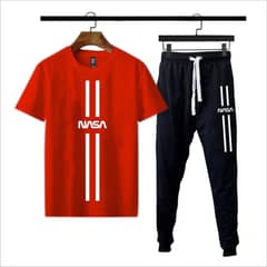 Stylish black track suit featuring a printed T-shirt and matching trou