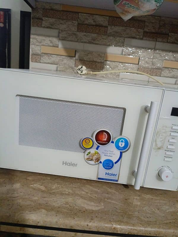 microwave oven , used but new condition 1