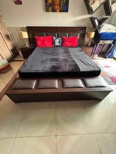 Semi Wood King sized bed with 2 side tables