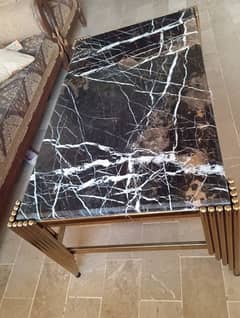 marble top with golden frame