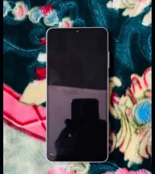 Samsung A06.1 month used hai. New condition hai. 2