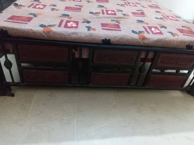 Iron Rod Bed with Wooden Work With Diamond Foam  Slightly Used. 1