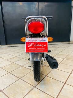 Honda 125 red colour open papers applied for