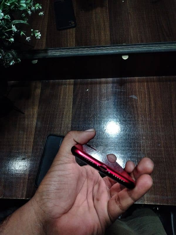 iPhone 11 red JV 64gb 10 by 9.5 5