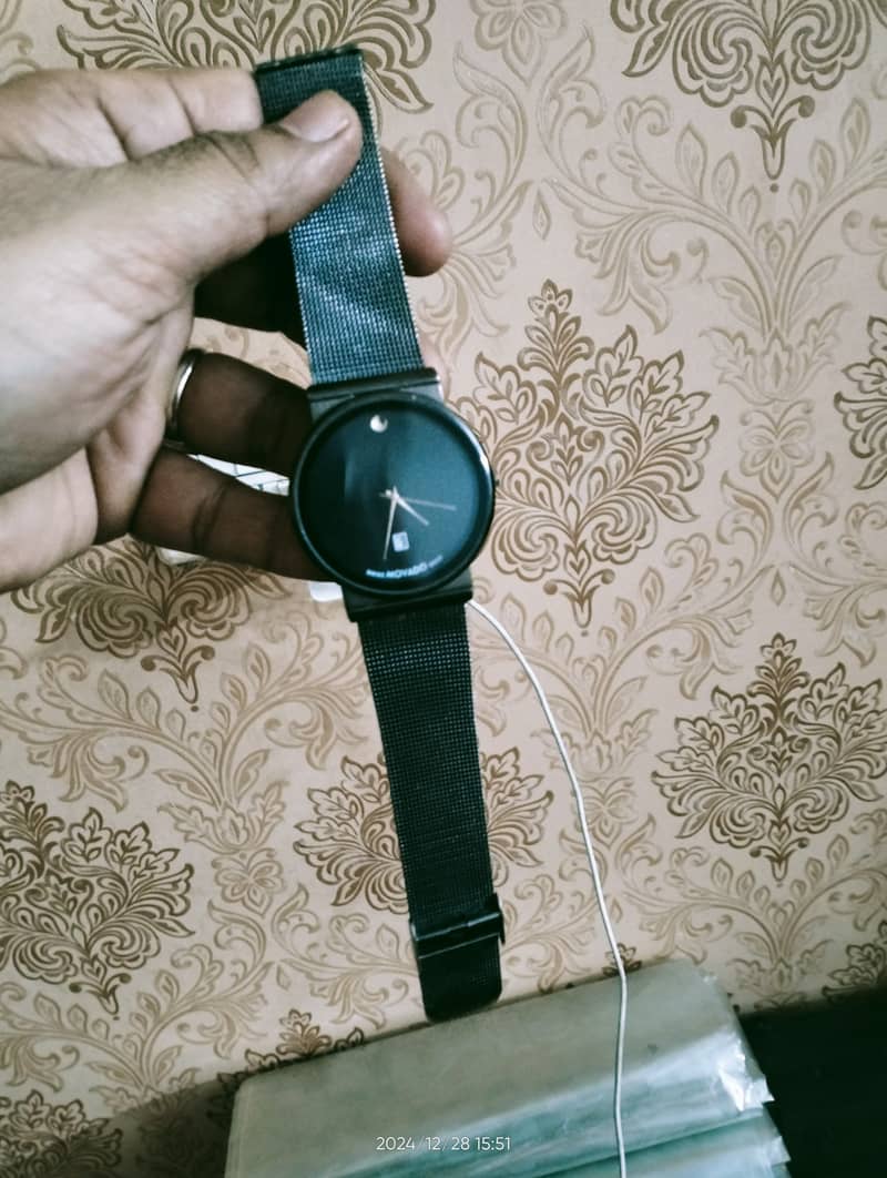 Movado watch detail contact 4