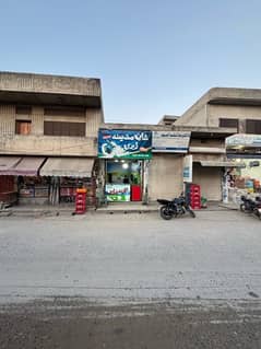 1.5 marla commercial shop 12 ft fromt located on main shadullah road