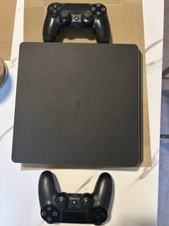 PS4 Slim- 500GB w/ 2 Controllers