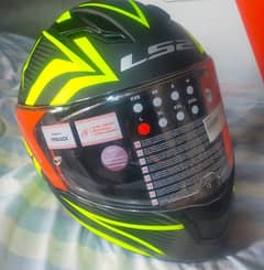 green Ls2 flipup helmet.