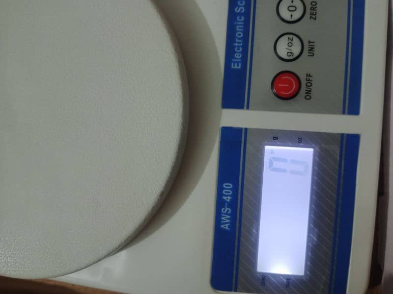 Digital wait scale And 2 stapler for sale 1