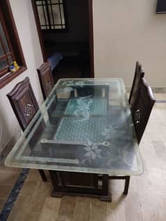 Dinning Table with Glass Top and 06 Chaits