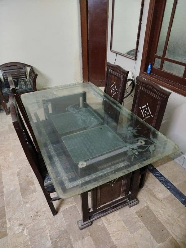 Dinning Table with Glass Top and 06 Chaits 1