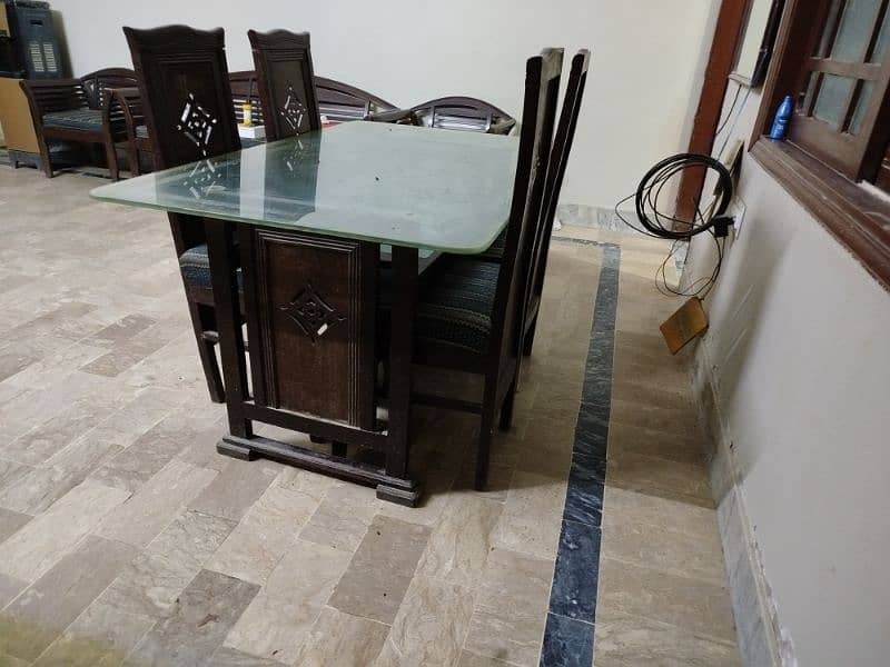 Dinning Table with Glass Top and 06 Chaits 2