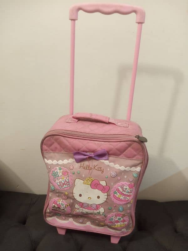 kids school trolley bag pink colour hello kitty good condition 6