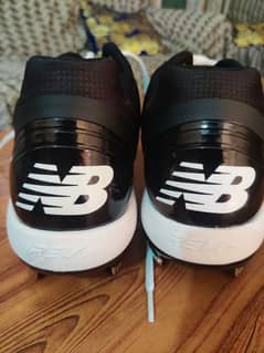 New Balance football cleats (Shoes)