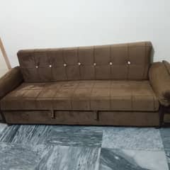 Sofa cum bed with table