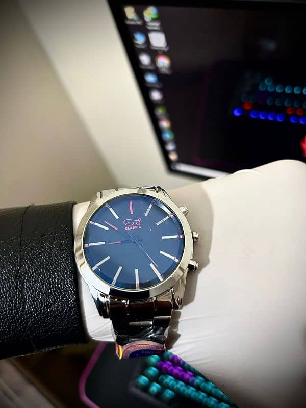 silver watch with blue dial with stainless steel straps 1