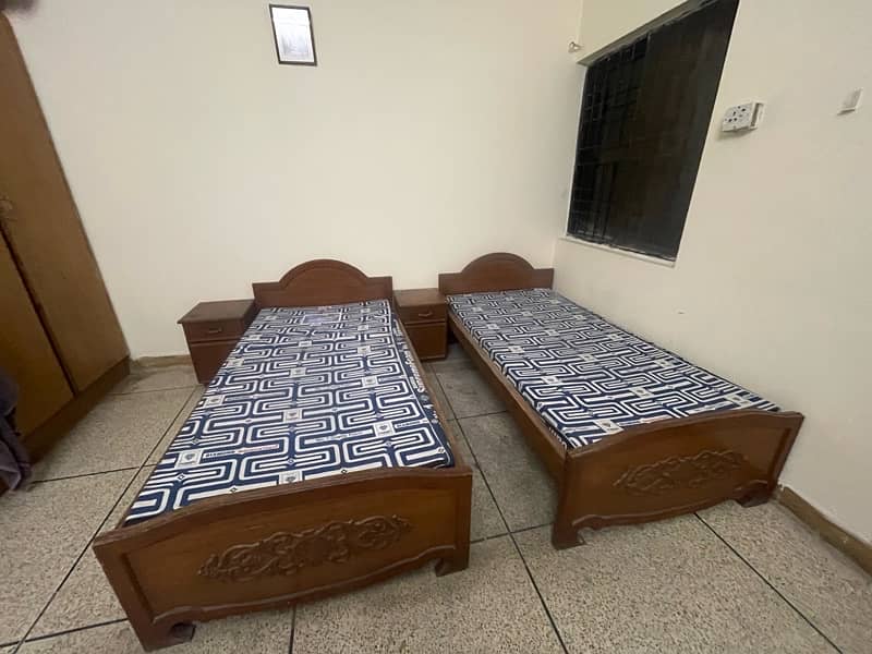 Pure wooden 2 single beds with new mattresses and 2 side tables 1