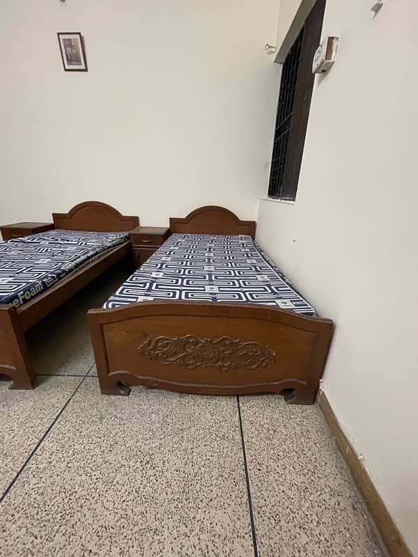 Pure wooden 2 single beds with new mattresses and 2 side tables 2