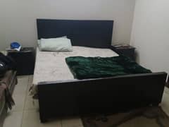 King size bed with 2 side tables is up for sale