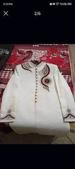 White shervani in very good condition.