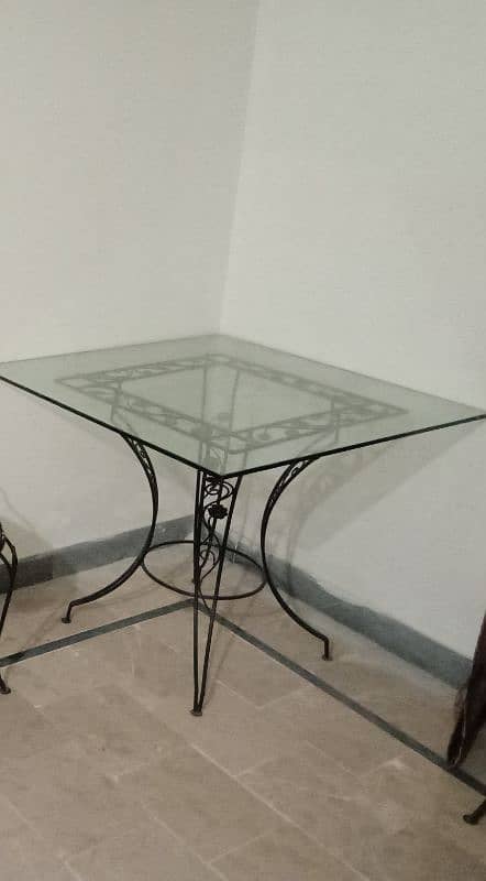 IRON GLASS DINING TABLE ( 12 MM GLASS)DINING TABLE GOOD CONDITION 1