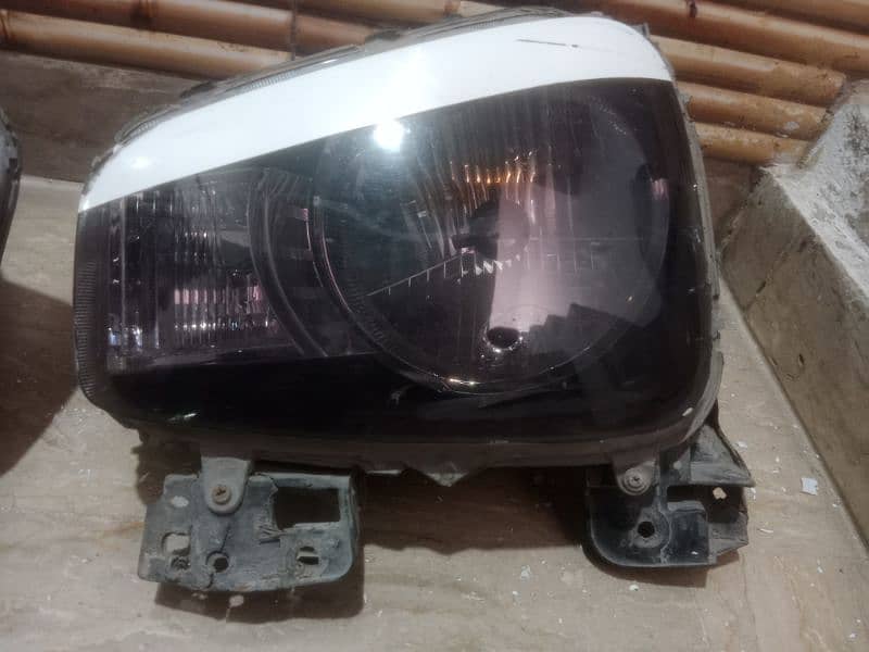 Suzuki Alto Head lights geniune. 1