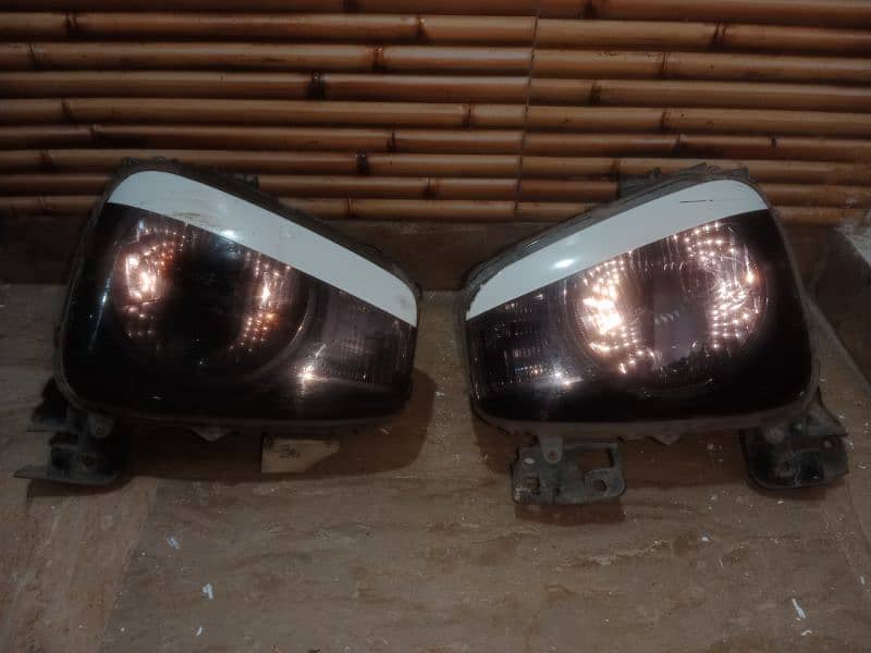 Suzuki Alto Head lights geniune. 3