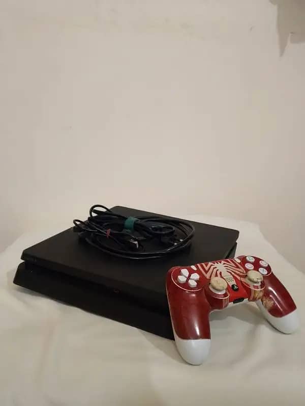 Playstation 4 (Slim) + 27 games + Spiderman Controller 2