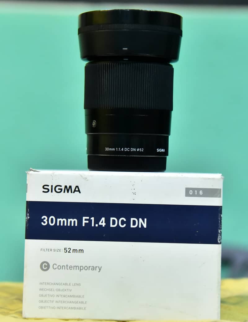 Sigma. 30mm 1.4. dcdn sony 1