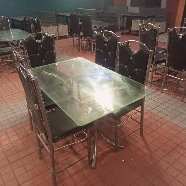 Dining tables, iron chairs, coke chiller & wall fan for sale 0