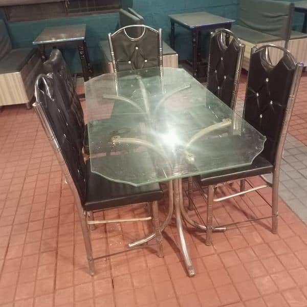 Dining tables, iron chairs, coke chiller & wall fan for sale 1