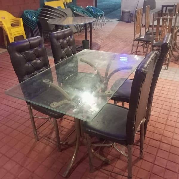 Dining tables, iron chairs, coke chiller & wall fan for sale 2