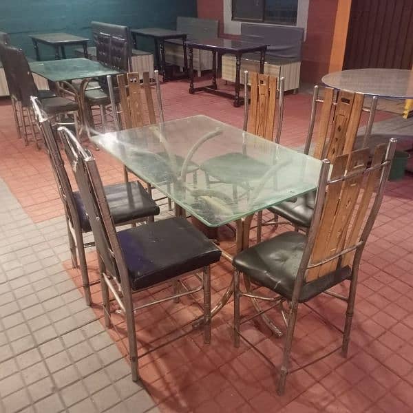 Dining tables, iron chairs, coke chiller & wall fan for sale 6