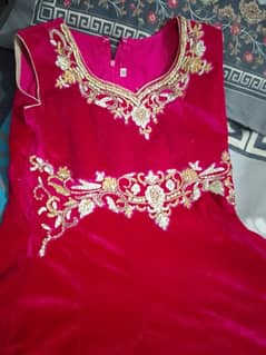 Dark pink colour Dress very well Velvet frock with good fancy work