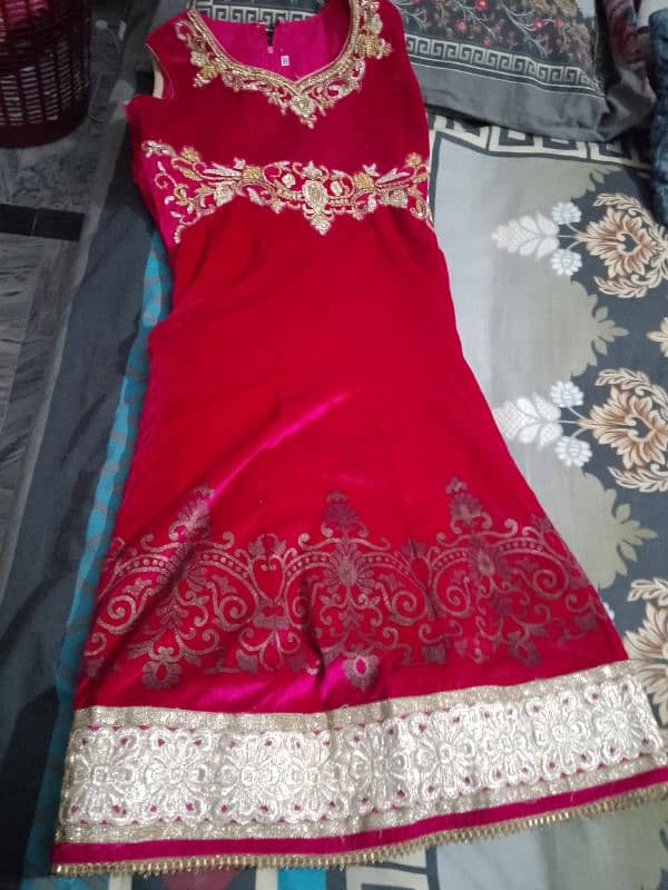 Dark pink colour Dress very well Velvet frock with good fancy work 1