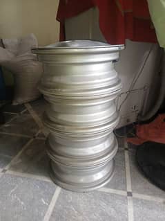 brand new Suzuki cultus original company rims with wheel cup