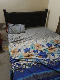 wooden double bed with matress