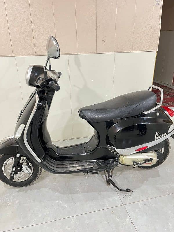 scooty 100cc 1