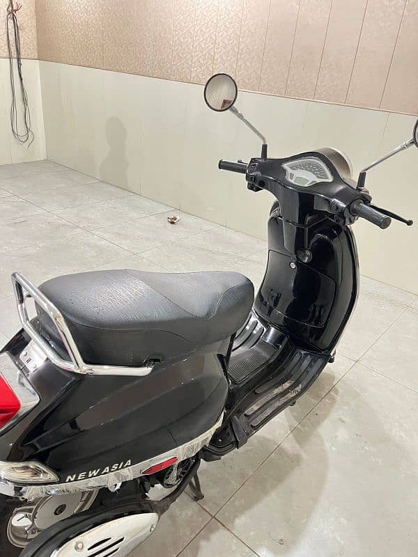 scooty 100cc 4