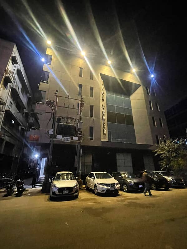 Dha Ph 2 (ext) | Main 24th Com Street | Next To Khe Ittehad | 3000 Sqft Office Floor For Rent | Front Entrace | 3 Side Corner | Lift | 100 Ft Wide Road | Modern Glass Elevation | Ideal Space For Clinic, Institute, Firms | Reasonable Rent | 1