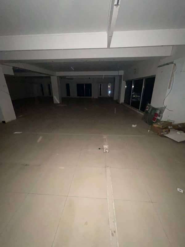 Dha Ph 2 (ext) | Main 24th Com Street | Next To Khe Ittehad | 3000 Sqft Office Floor For Rent | Front Entrace | 3 Side Corner | Lift | 100 Ft Wide Road | Modern Glass Elevation | Ideal Space For Clinic, Institute, Firms | Reasonable Rent | 9