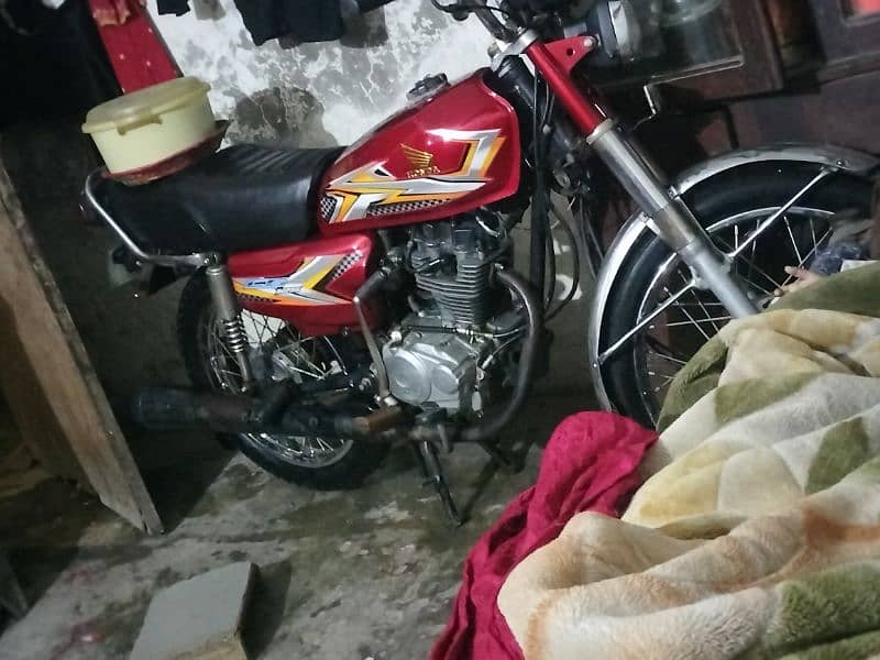 Honda 125 location Lahore ki hat 0