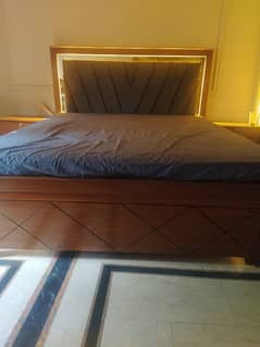 pure wooden king size bed with attach lights and side tables