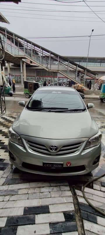 Toyota Corolla GLI 2014 shimmering metallic Green Colour 3