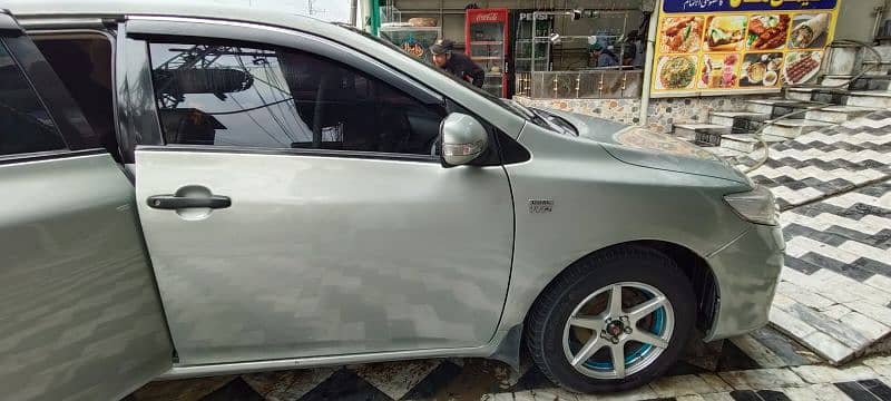 Toyota Corolla GLI 2014 shimmering metallic Green Colour 12