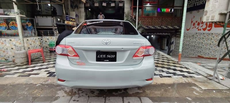 Toyota Corolla GLI 2014 shimmering metallic Green Colour 16